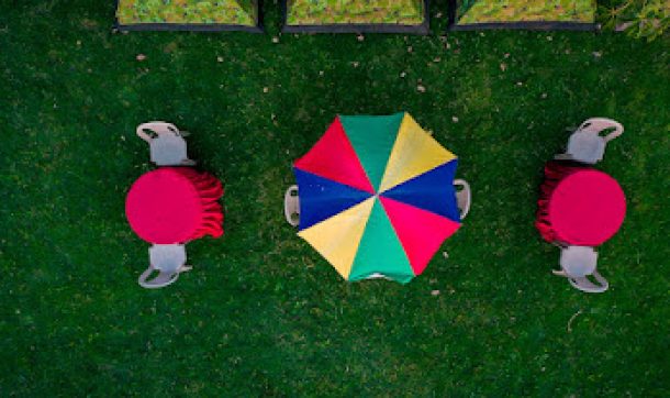 tents with chair and table mounted on lawn area