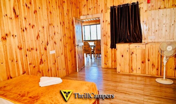 wooden villa in pawna lake bedroom